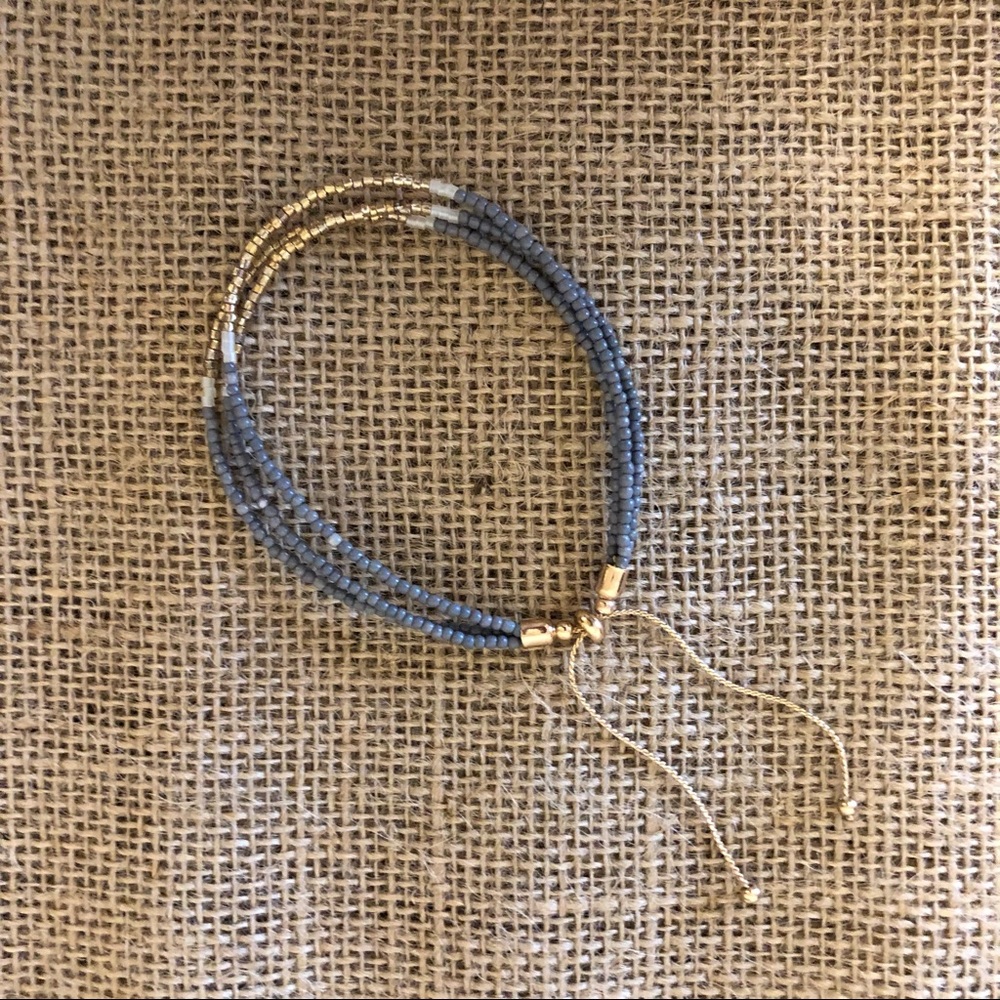Elegant Gold and Blue Beaded Bracelet